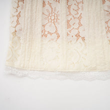 Émeline floral lace flared-cuff mini dress in Neutrals